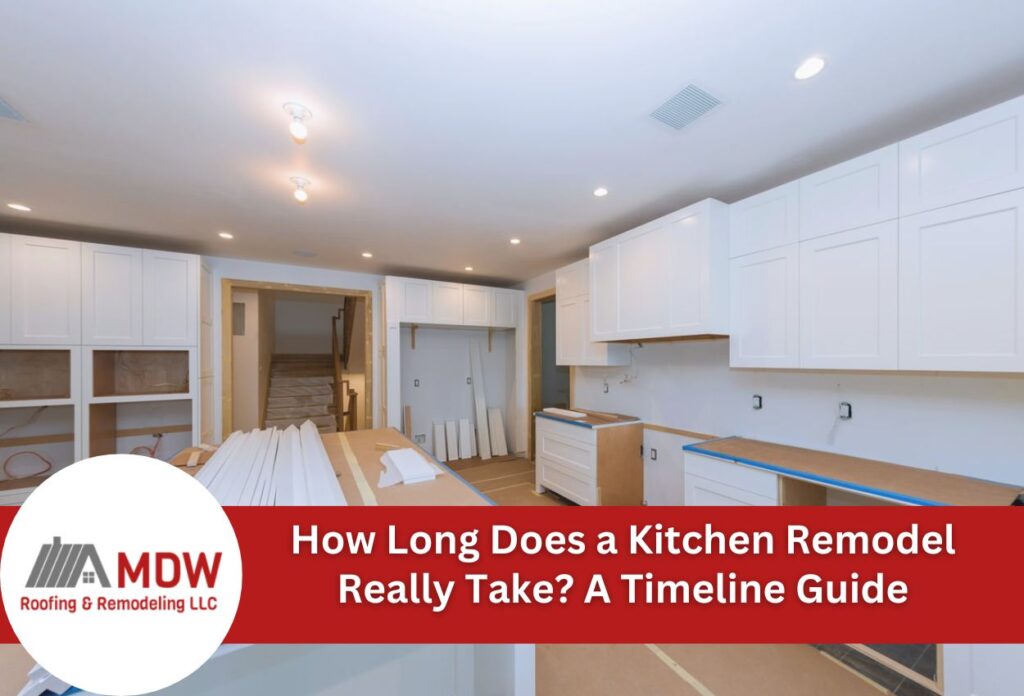 Kitchen remodel in progress with white cabinets and exposed countertops during construction