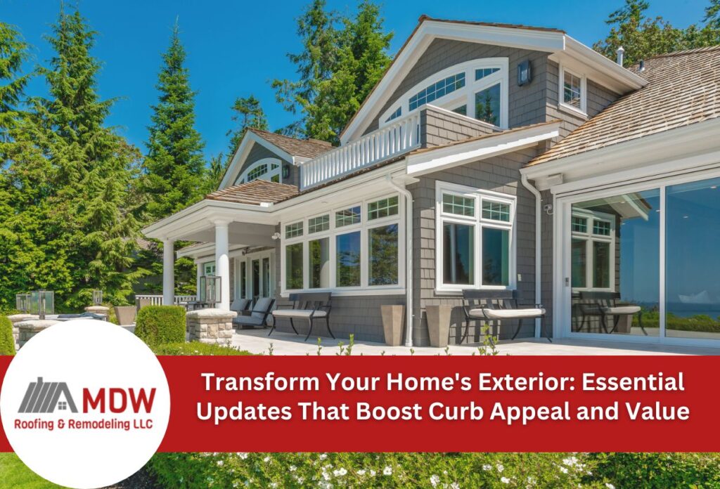 Modern gray shingle house with white trim, large windows, and covered patio